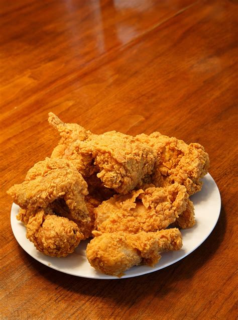 Golden fried chicken - 1. In a large bowl, combine buttermilk, hot sauce, and salt. 2. Add the chicken to the buttermilk and toss to combine. Cover or seal and let stand for 30 minutes, or for juicier chicken, refrigerate for several …